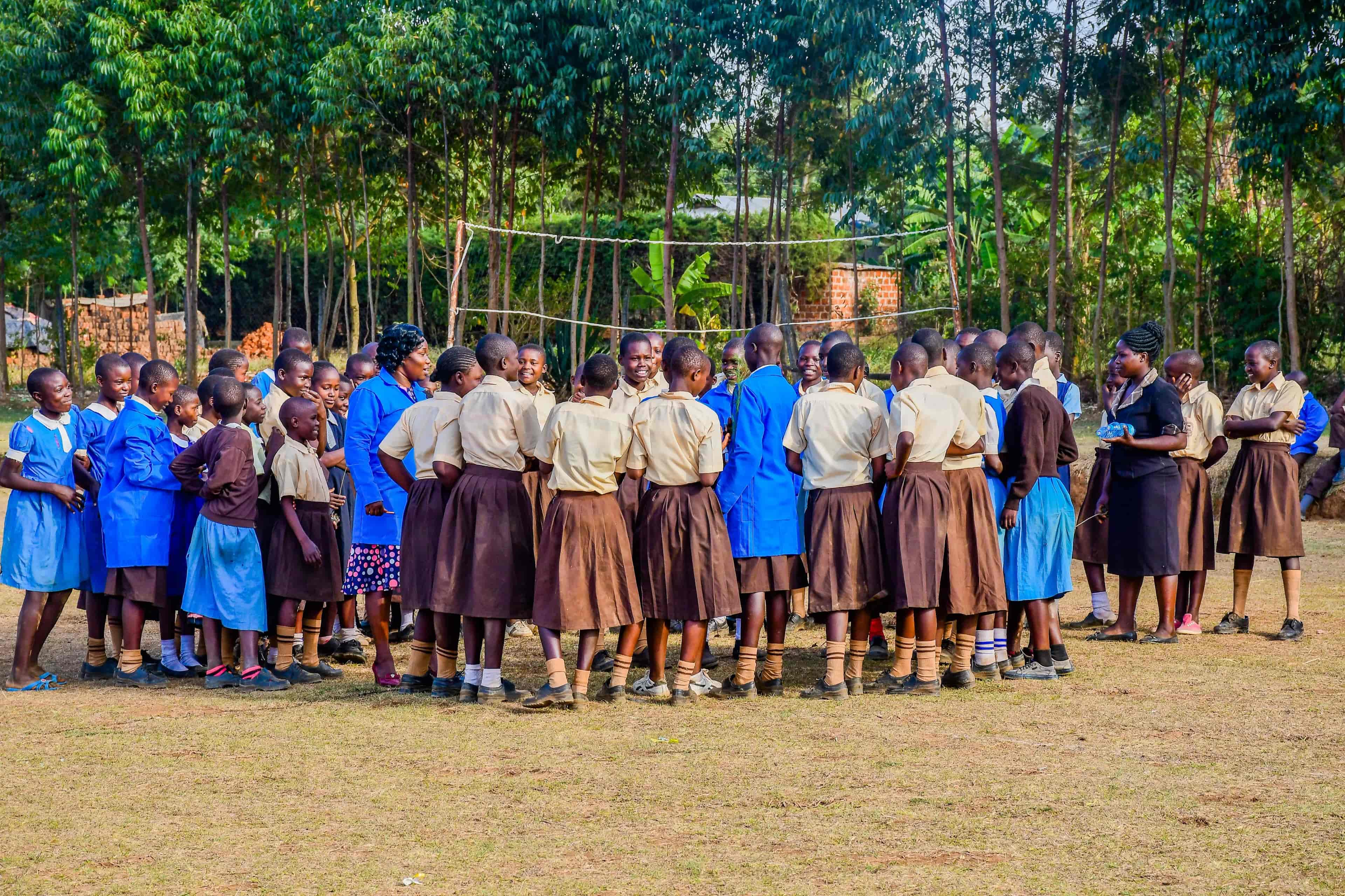 Teenagers forming a circle