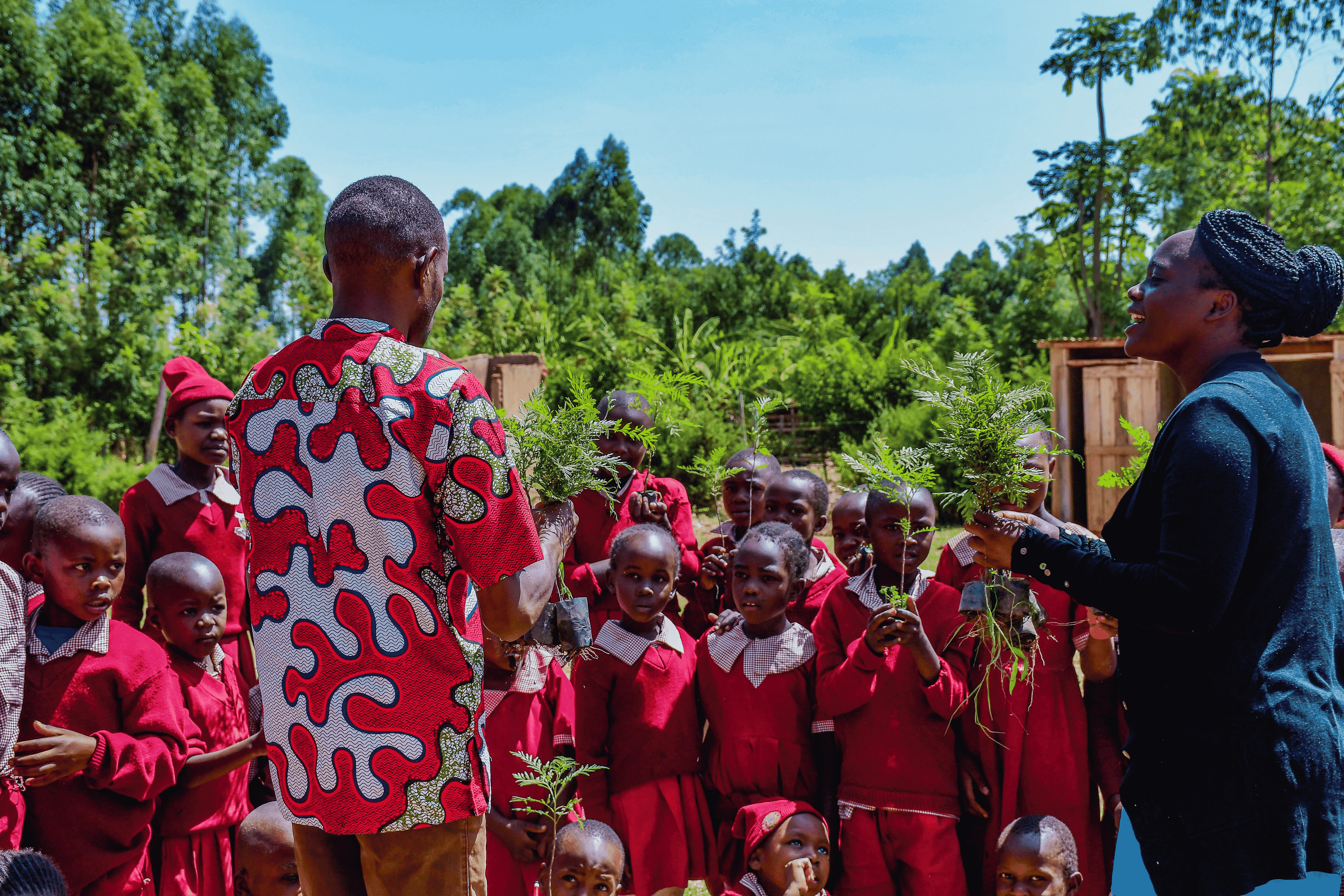 Man giving instructions to children
